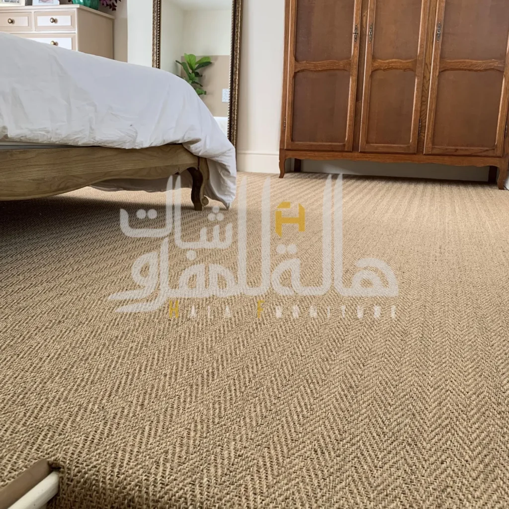 Cream berber wall to wall carpet installed in a bedroom, Dubai villa